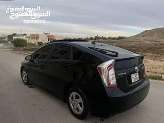  5 تويوتا بريوس 2015 هايبرد فل كامل مع بانوراما أعلى صنف بكج ( 5) لون اسود مميز