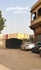  2 ارض للبيع في قصر بن غشير شارع فرصة