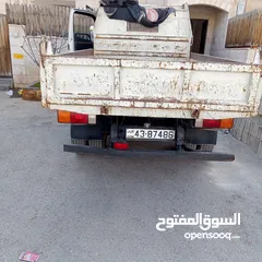  4 Hyundai Mighty dump truck