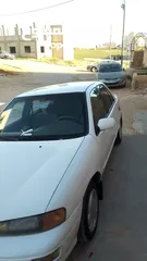  2 كيا سيفيا لون ابيض دهان جيد
