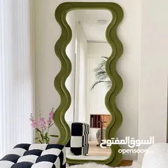  8 مرايا ترند عالمياً... تصميم موجي ومنحوت فخم يخلي أي زاوية تصير قطعة فن جاهزة للتصوير