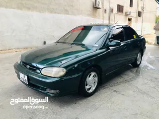  4 كيا سيفا موديل 1998 لون اخضر  اصلي بحاله الوكاله  فحص 3 جيد مرفق بالصور