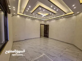  6 شقه ارضيه للبيع بجبل الحسين135م مع ترس50م