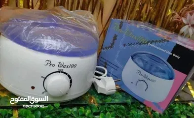  2 جهاز الواكس  الاصلي لازاله الشعر +  شمع + عيدان واكس طنجرة اذابه شمع
