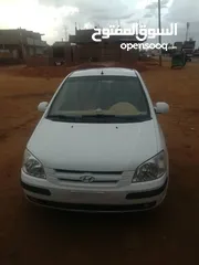  1 هيونداي كلك لونها ابيض 2003