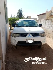  12 بك اب متسوبيشي   l200 موديل 2009 فور ويل 4X4