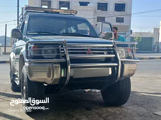  1 ميتسوبيشي باجيرو موديل 1997 نخب فحص كامل دفع رباعي السعر قابل للتفاوض