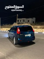  7 مازدا 5 جير عادي 6+1 متور 2000 بنزين رخصه و تامين جديد  عداد قليل فحص نخبب سعرر كااششش