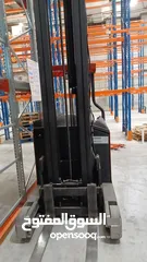  4 BT reach truck Forklift model RRB5  Used warehouse electrical forklift used for stacking products.