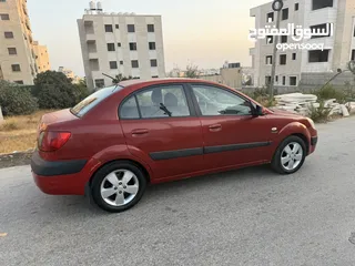  3 كيا برايد حمراء 2007