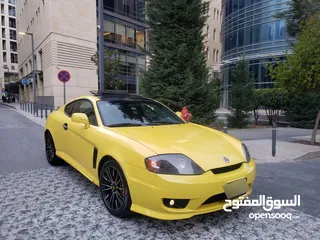  11 هونداي توسكاني شكل 2005 كامله الاضافات
