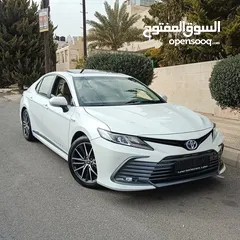  1 تويوتا كامري 2023 بحالة الوكالة GLE فحص 7 جيد