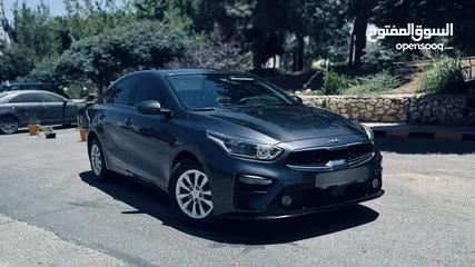  21 Kia cerato   Model :2019  Dohc 1600 CC  Gearbox : automatic   Colour: Gary  Inside :Black ABS Airbag