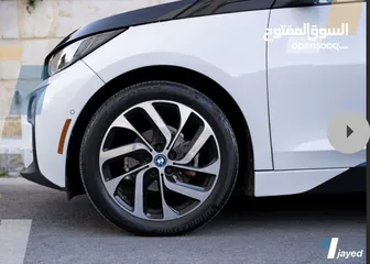  3 BMW i3 كهرباء بدون بنزين تيرا للبيع او بدل ع بكم حديث  ممكن البدل ع بكم عالي دوج او فورد 2015