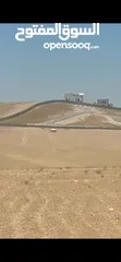  6 للبيع قطعة أرض 3.4 دونم في النقيره شارع الميه خلف كازيه جوبترول شارعين بالقرب من مشروع الشهد 4