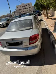  4 كيا ريو بحالة ممتازة  جير عادي 2004