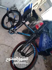  25 بيع بسكليت بحاله جيده جدااا اللون اسود وازرق واضح بالصوره غيارات شغاله وبرك شغال 100%