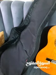  11 جيتار Valencia CG160 جديد غير مستعمل مع شنتة وريشة وآلة دوزان الاوتار كلو مع تشطيب لامع طبيعي للخشب