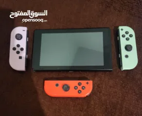  1 نينتندو سويتش مع كينترولارنينتندو سويتش مع كينترولارنينتندو سويتش مع كينترولار