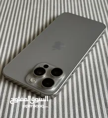  1 iPhone 15 bro Max natural titanium 256 GB used like a new