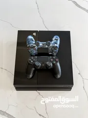  1 PlayStation 4 - 1TB + 2 Controllers (Digital Only Excellent Condition)