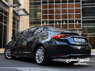  2 تويوتا كورولا هايبرد فحص كامل وارد المركزية وصيانة المركزية لون اسود مميز بحالة جيدة جدا كوشوك جديد