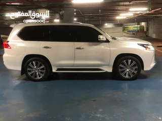  1 DHS 215,000/= 2019 LEXUS LX570 TOP - قمه في النظافه - مسرفس بالكامل  - بحالة ممتازة جداً - فل اوبشن