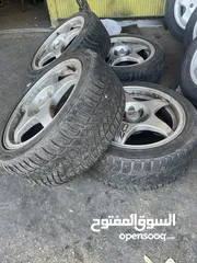  2 طقم جنطات مع الكوشوك بيجو