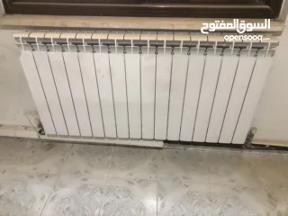  18 ماطور تدفئة مركزية مع خزان سولار مع الراديترات (المشعاعات)