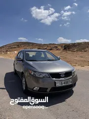  25 كيا فورتي 2010 مواصفات فل si