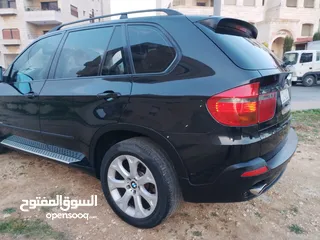  11 BM  X5 بي ام اكس  موديل 2009 أعلى مواصفات يقبل من الثمن قطعة أرض او البدل