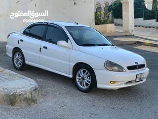  19 كيا ريو اتوماتيك موديل 2003 بحالة ممتازة