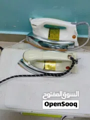  4 مكواة ملابس 2 جيده معه طابعه