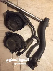  4 كربراتير ودينمو وطنابير وتيل فرامل وغطى ردياتير