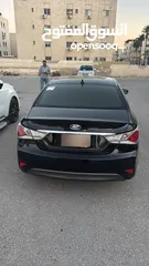  9 هونداي سوناتا هايبرد 2012 لون اسود  فل ما عدا الفتحة فحص كامل للبيع المستعجل