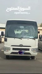  1 Rental Coaster Bus & Shuttle Services staff transport. كوستر حافلات لإيجاد