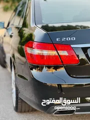  14 E200 AMG 2013 اقل عداد غرغوريه شبه جديده فحص كرت ابيض