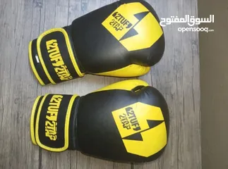  4 كفوف ملاكمه وواقيات رجلين ماركه 2 TUF أقوى واحسن ماركه بالتصنيع....وباندج venom غير مستعملين....