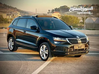 20 سكودا كاروك 2019/اتوماتيك ماتور 1500 بنزين فل الفل  فتحة سقف بانوراما