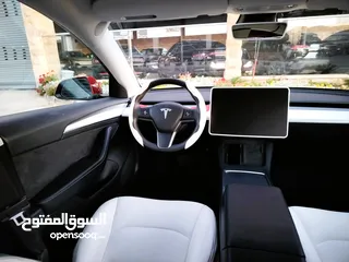  21 تيسلا 2022 model 3 فحص كامل 4 جــيـــد بدون ملاحظات غرفة جلد ابيض لون مميز بحالة الوكالة بسعر لقطة