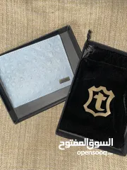  1 محفظة ماركة تميمة