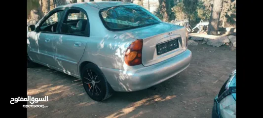  4 دايو لانوس موضيل 2002 بحاله جديدة