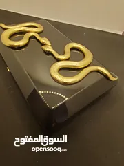  18 حقيبة كلاتش من ماركة كيليان ذا تمبتريس سوداء وراقيه ،Black Clutch The Temptress by Kilian