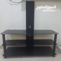  1 طاوله تلفزيون شبه جديده