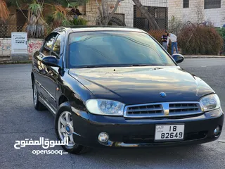  14 كيا سبكترا  موديل 2000لون اسود محرك 1500بحالة الوكالة فحص امامي دقات خلفي جيد جيد بحالة الوكالة