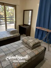  17 شارع الجامعة - شقة مفروشة ارضي غرفتين شامل المياه والإنترنت للإيجار من المالك مباشرة