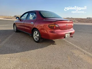  4 هيونداي افانتي 97 نظيفة للبيع ...لون خمري و دهان ممتاز