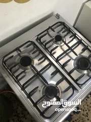  2 Medium size stove With Oven  Works very well. Good for small family