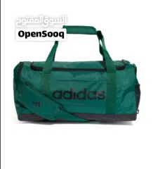  2 حقيبة دافل لينير بحجم صغير من  اديداس لون اخضر مع قنينة بيرفورمنس لون اسود مجاناً