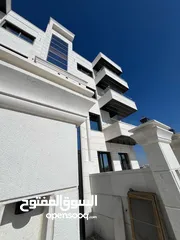  7 بالاقساط طابق ارضي مع ترس في تلاع العلي بتشطيب فندقي